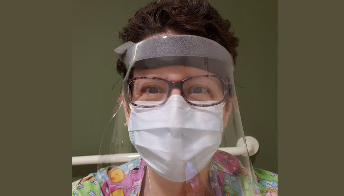 Sonja Sigler Harris in protective gear at work