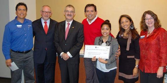 Consul Alberto Fierro Garza, Consulate of Mexico in Saint Paul and Chancellor Steven  Rosenstone (second and third from from left) present Riverland Community College’s Multicultural team with a grant for $14,000 to benefit  Mexican or Mexican-American students. Representing Riverland (l to r) are Edel Fernandez, Miguel Garate, Karem Salas-Ramirez, Yesenia Mendoza and Danielle Heiny.